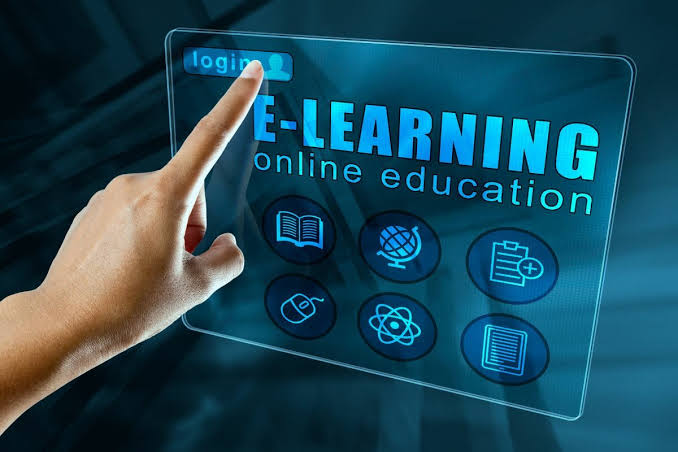 Person engaged in online learning on a laptop